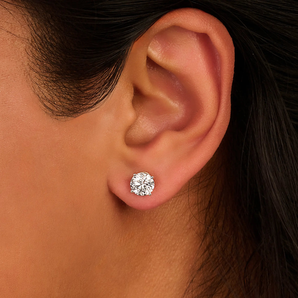 Solitaire Oorbellen 4-Poots · 2.5 ct.