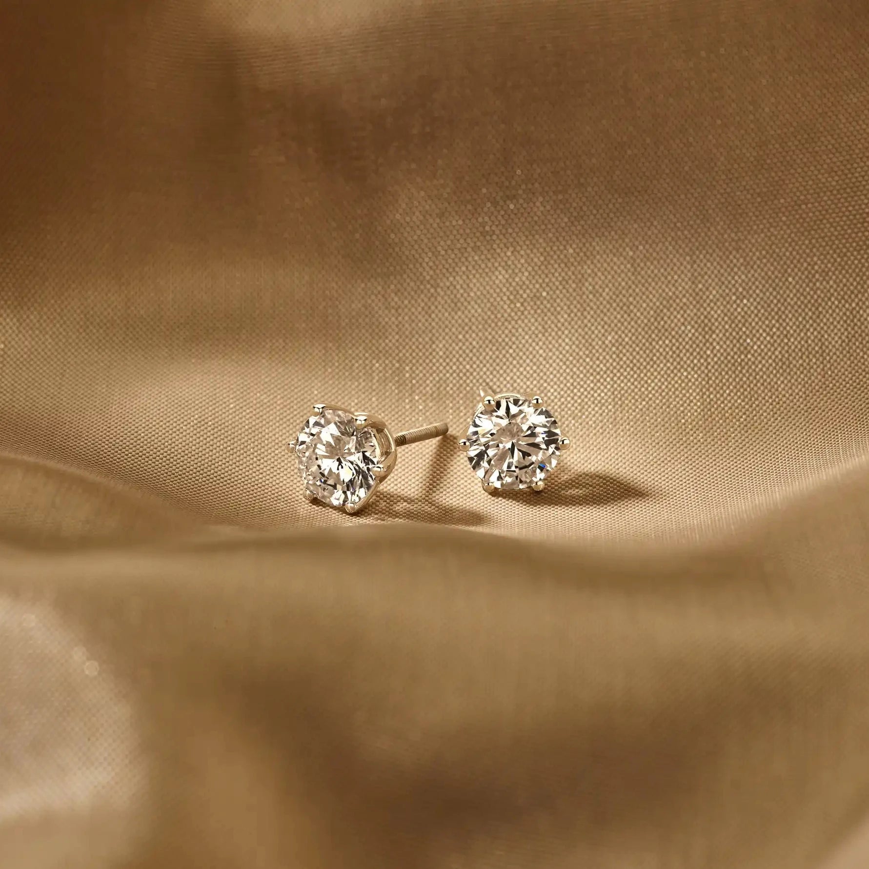 Solitaire Oorbellen 6-Poots · 2.5 ct.