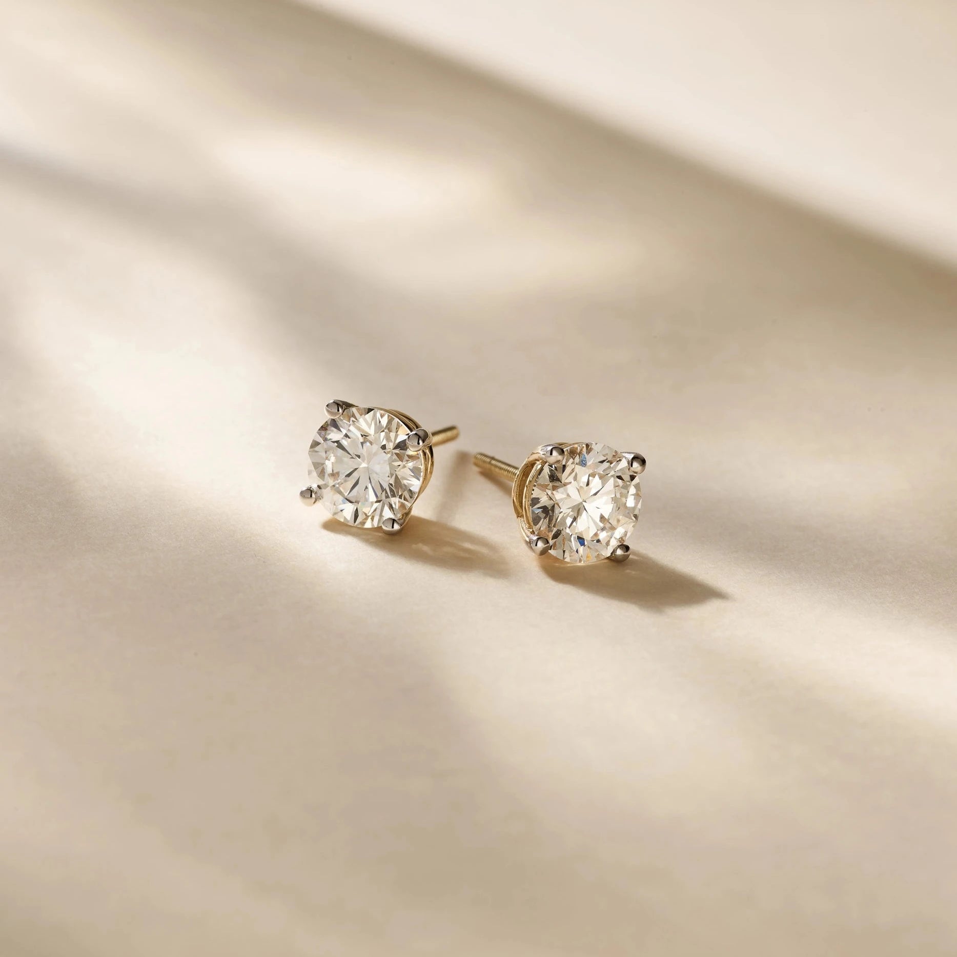 Solitaire Oorbellen 4-Poots · 2.0 ct.