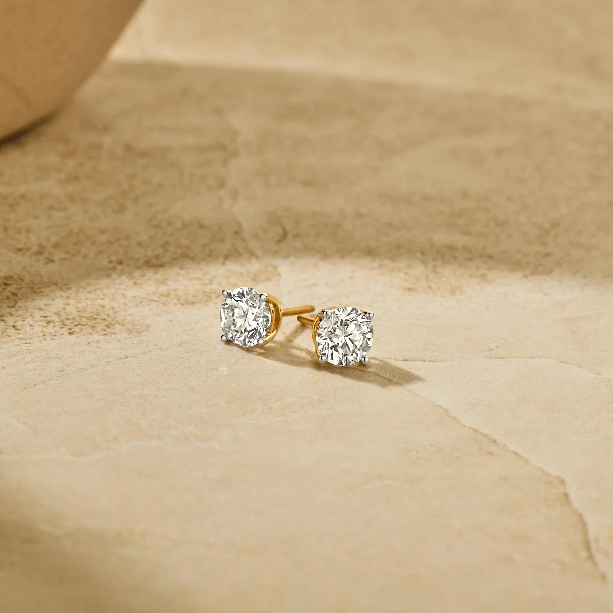 Solitaire Oorbellen 4-Poots · 2.5 ct.