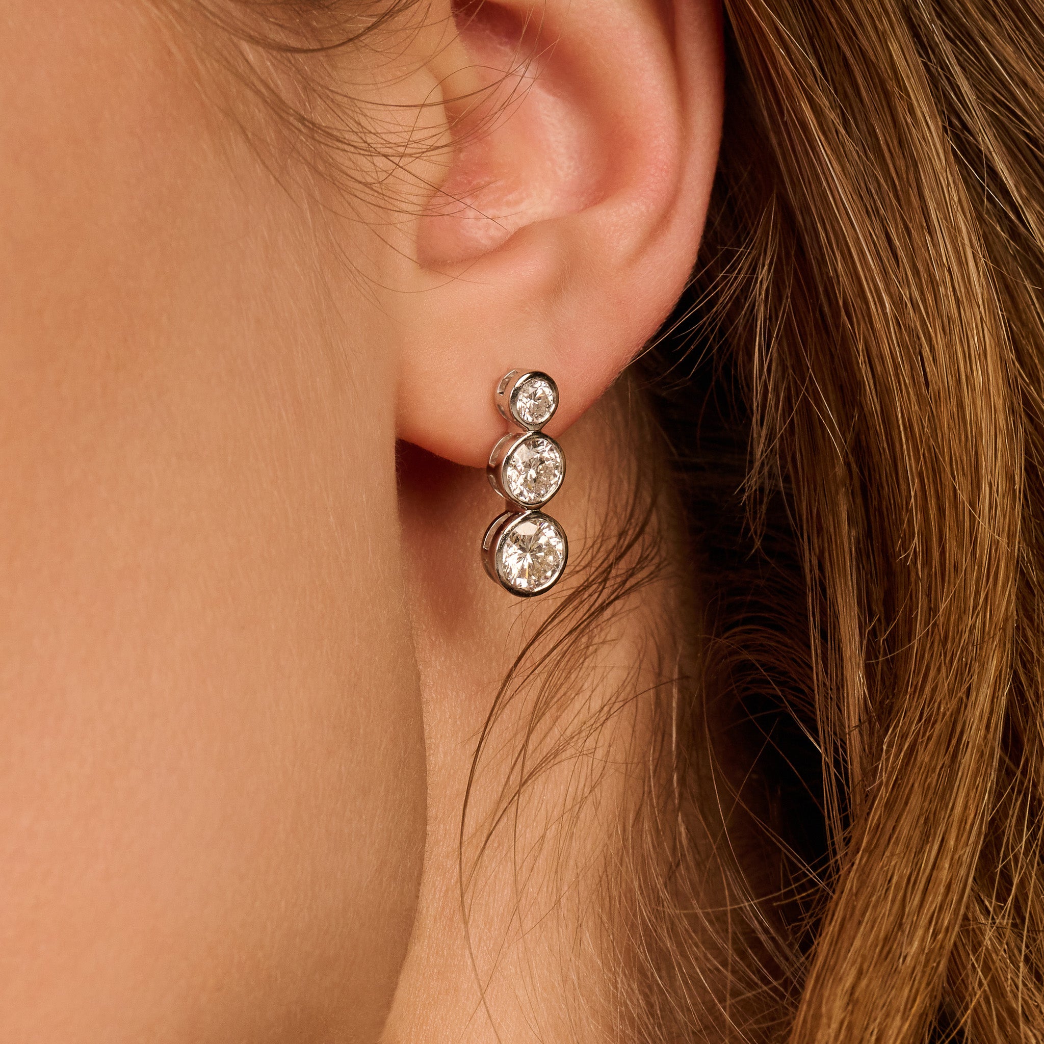Bezel trio oorbellen· 2.5 ct.