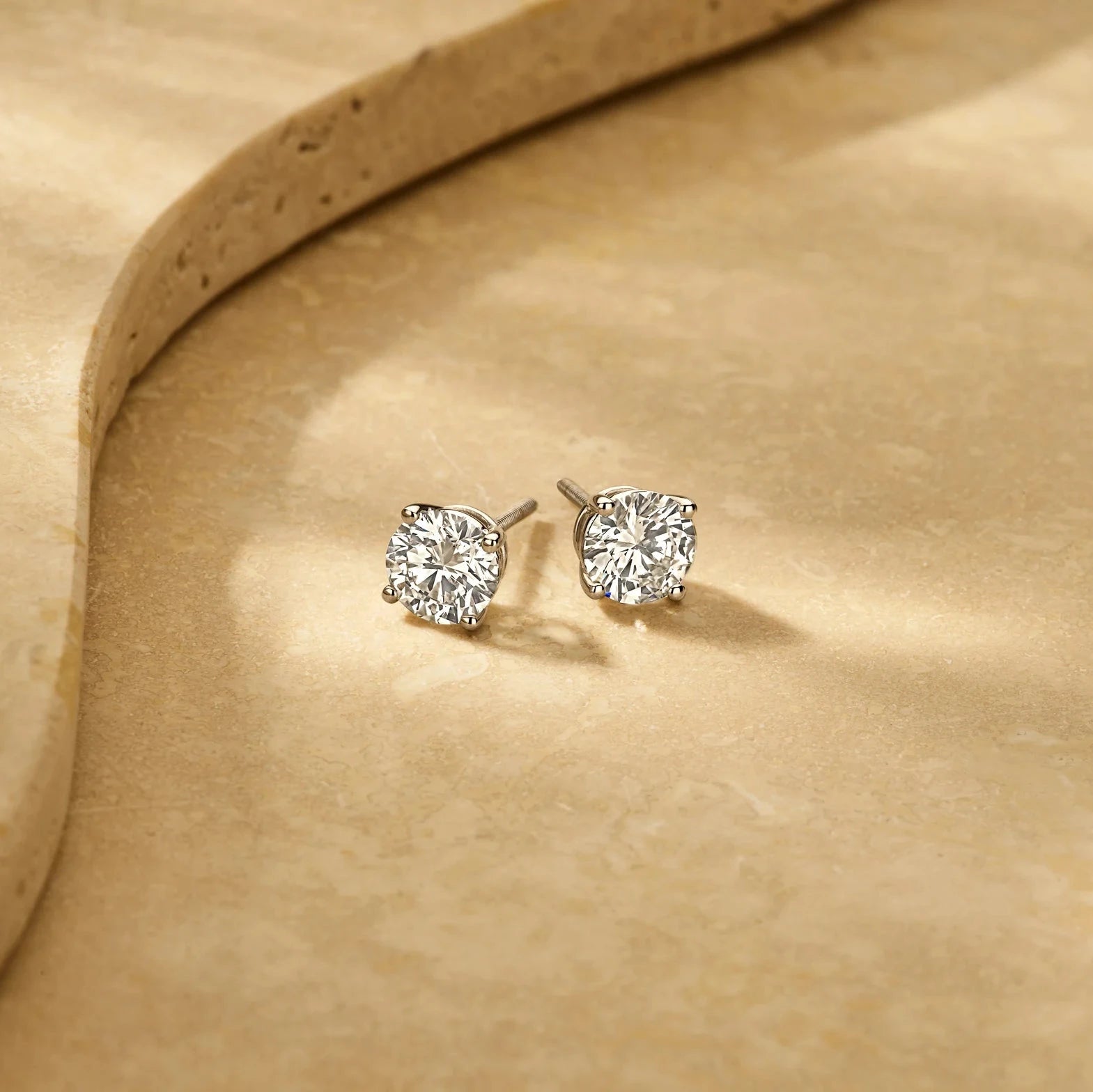 Solitaire Oorbellen 4-Poots · 2.0 ct.