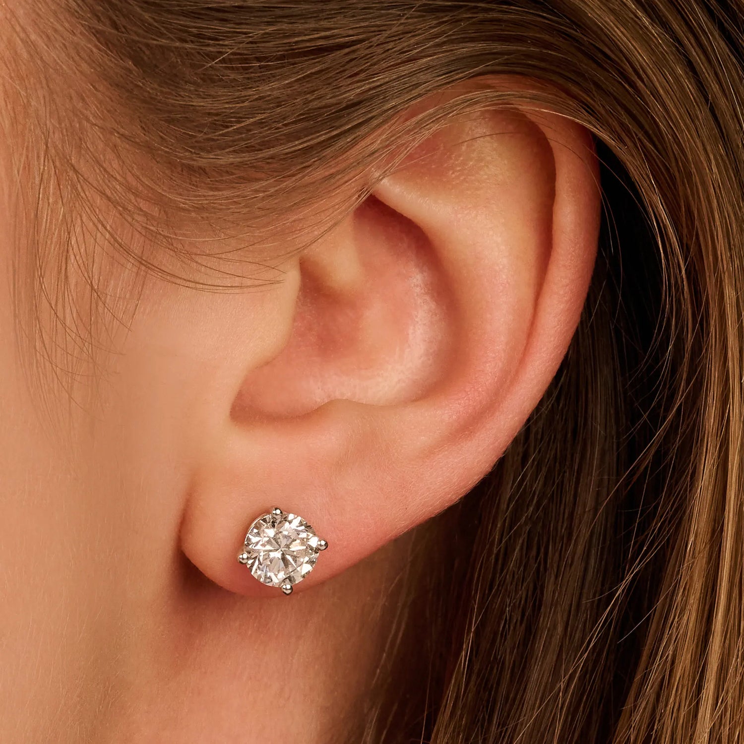 Solitaire Oorbellen 4-Poots · 2.5 ct.