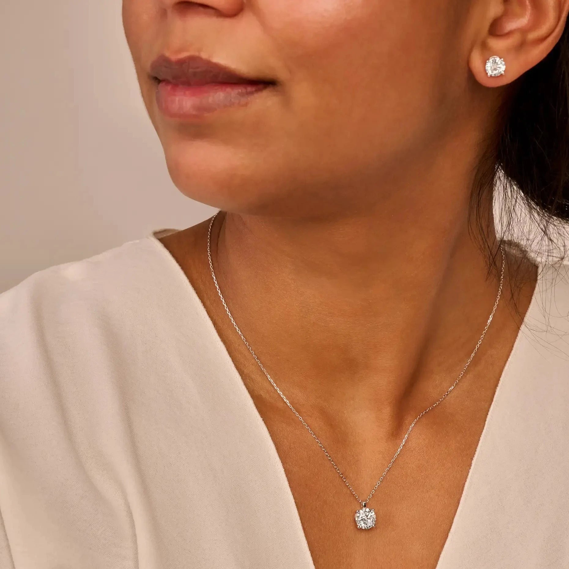 Solitaire Oorbellen 4-Poots · 2.5 ct.