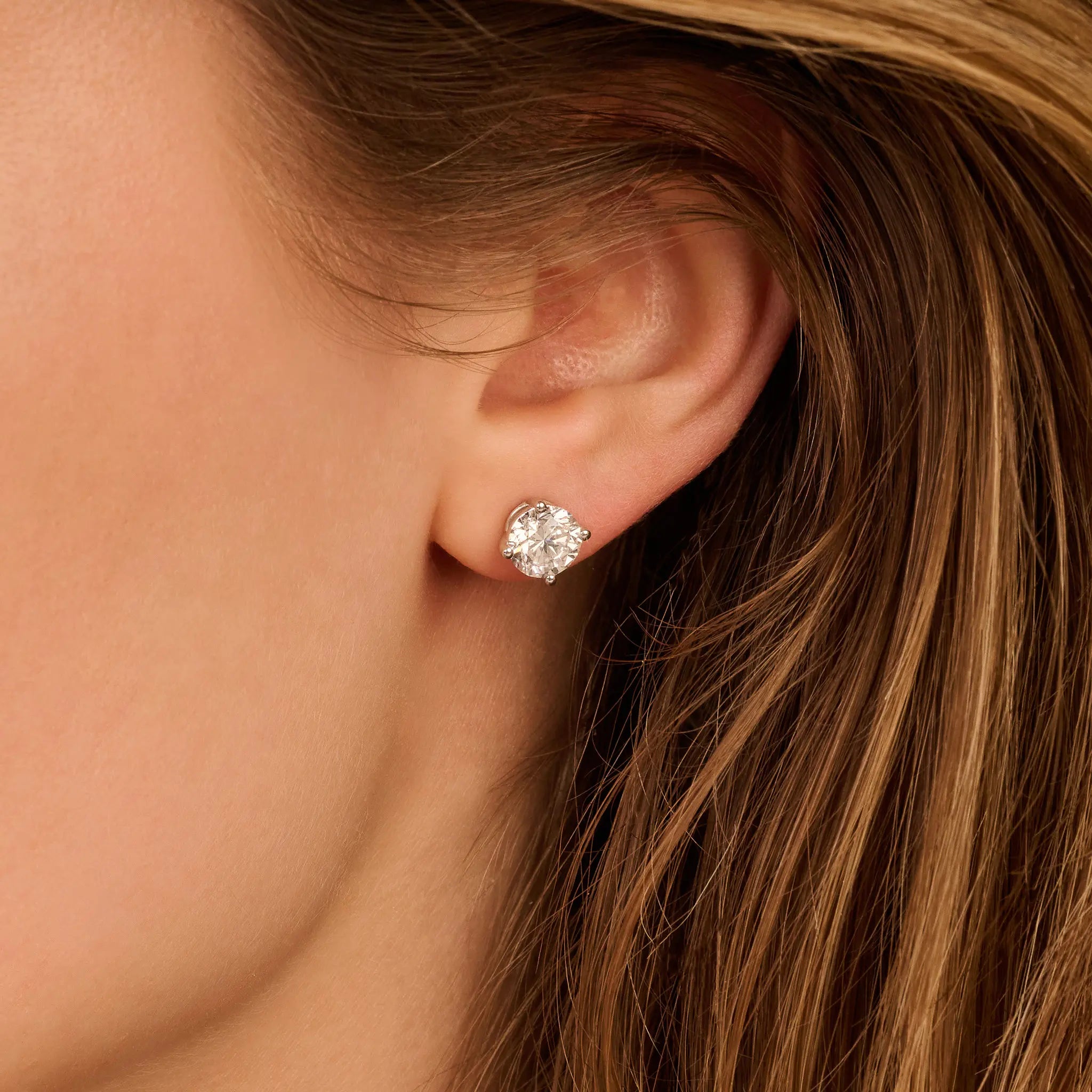 Solitaire Oorbellen 4-Poots · 2.5 ct.