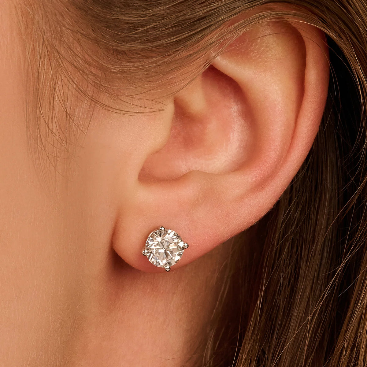 Solitaire Oorbellen 4-Poots · 2.5 ct.