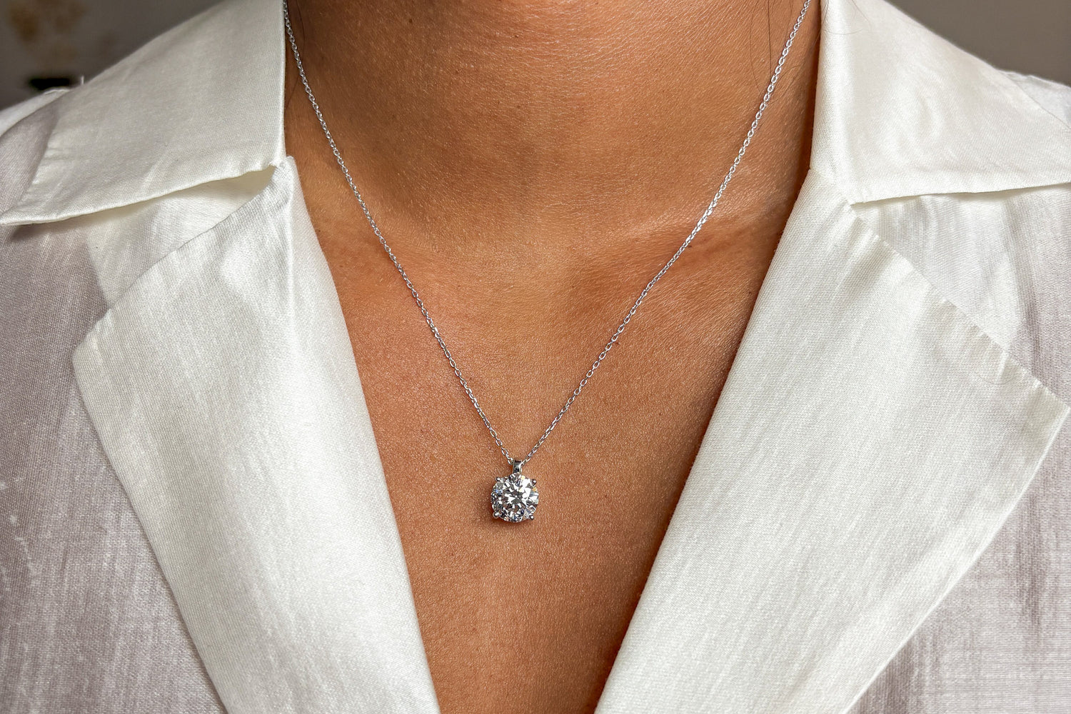 Solitaire collier · 2.0 ct · 14k witgoud