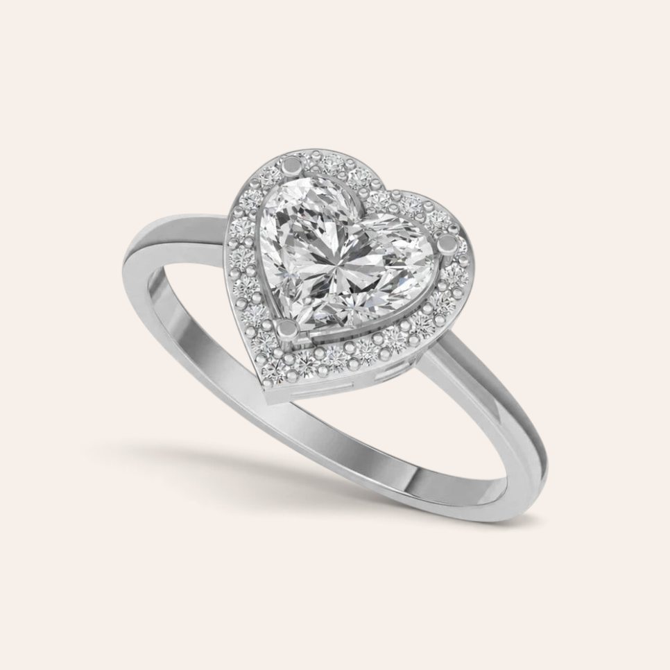 Louèn Diamonds hartvormige halo verlovingsring van 14k witgoud met een 2.0 karaat diamant en kleine accentdiamanten.