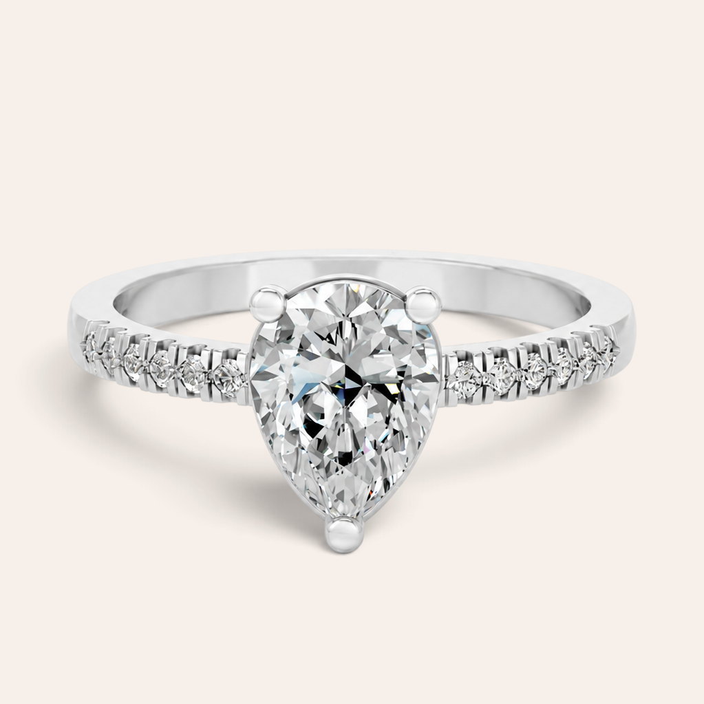 Louèn Diamonds verlovingsring met peervormige lab grown diamant en pavé gezette 14k witgouden band.