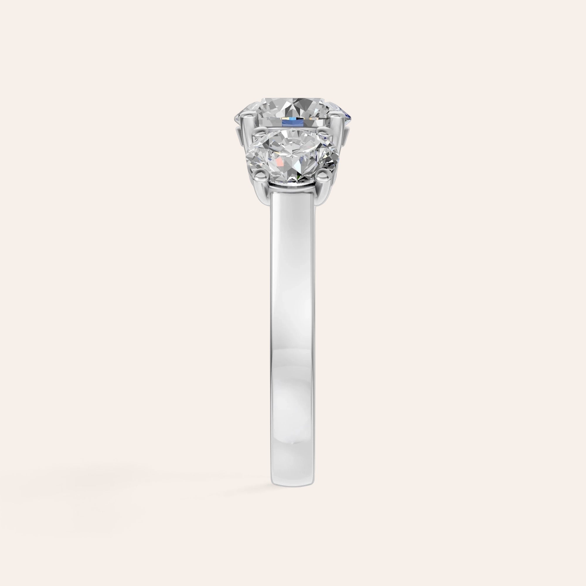 Louèn Diamonds trilogie verlovingsring van 14k witgoud met drie ronde lab-grown diamanten van 3.0 ct, zijaanzicht.