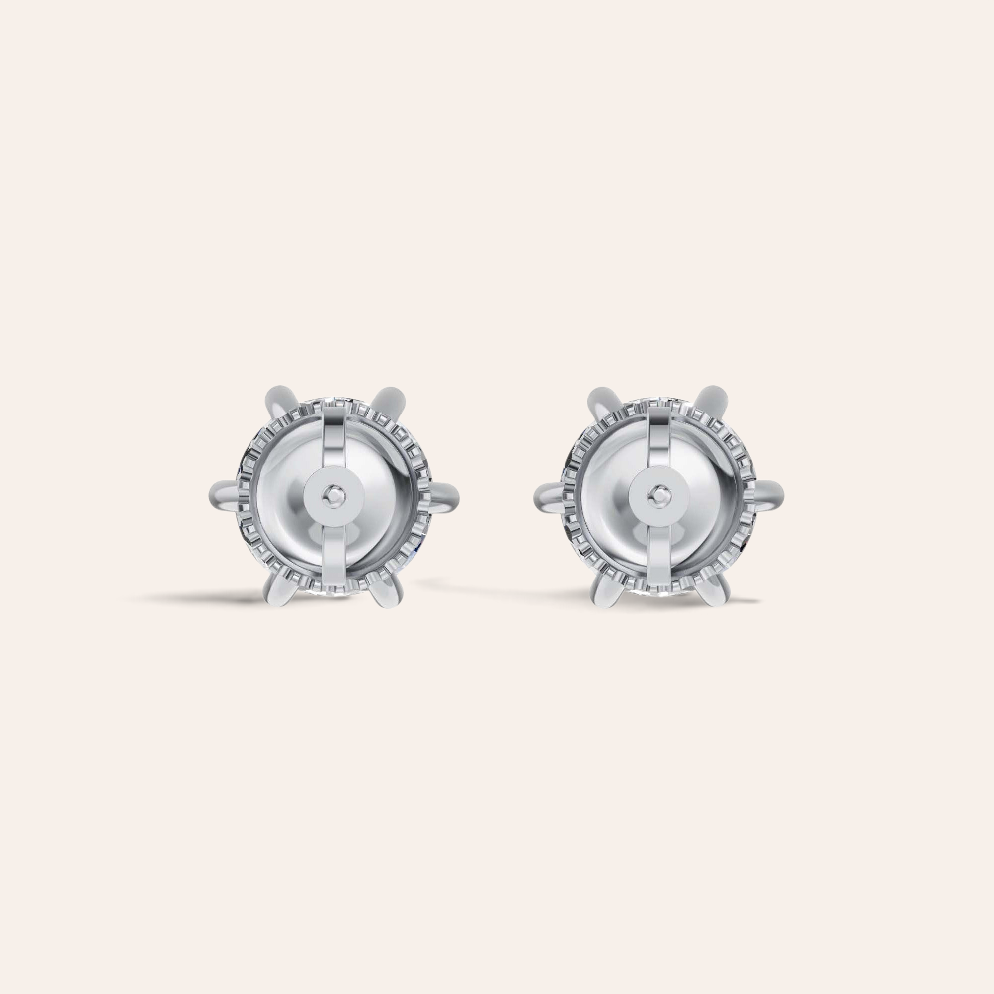 Louèn Diamonds solitaire oorstekers met 6-poots zetting in 14k witgoud, achterkant zichtbaar op een lichte achtergrond.